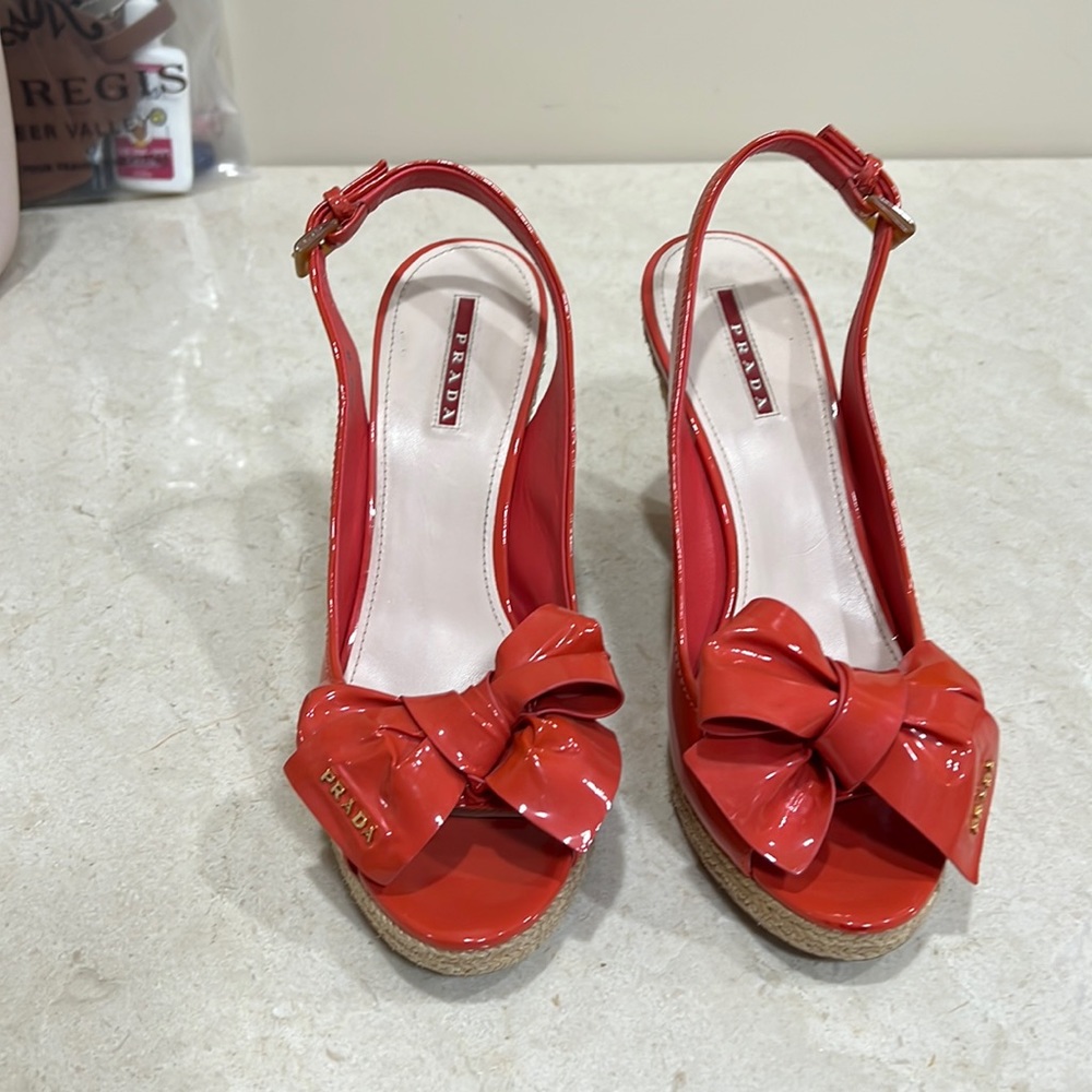 Orange Prada wedges